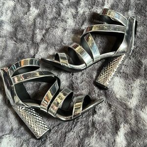 Super cute chrome/platinum sandals with Wide heel